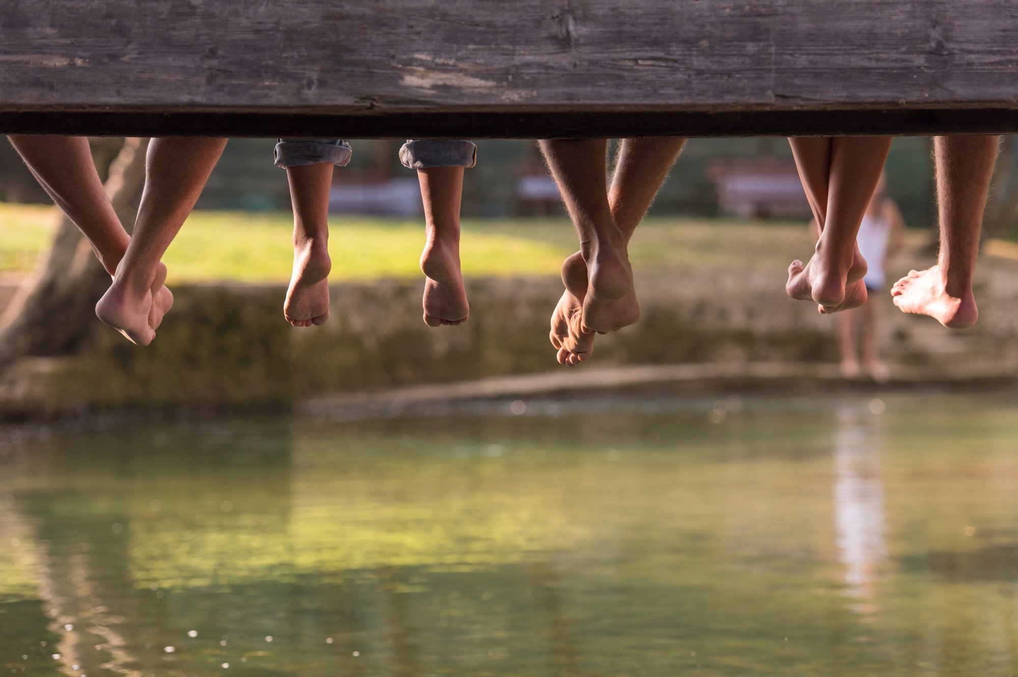 people over a river
